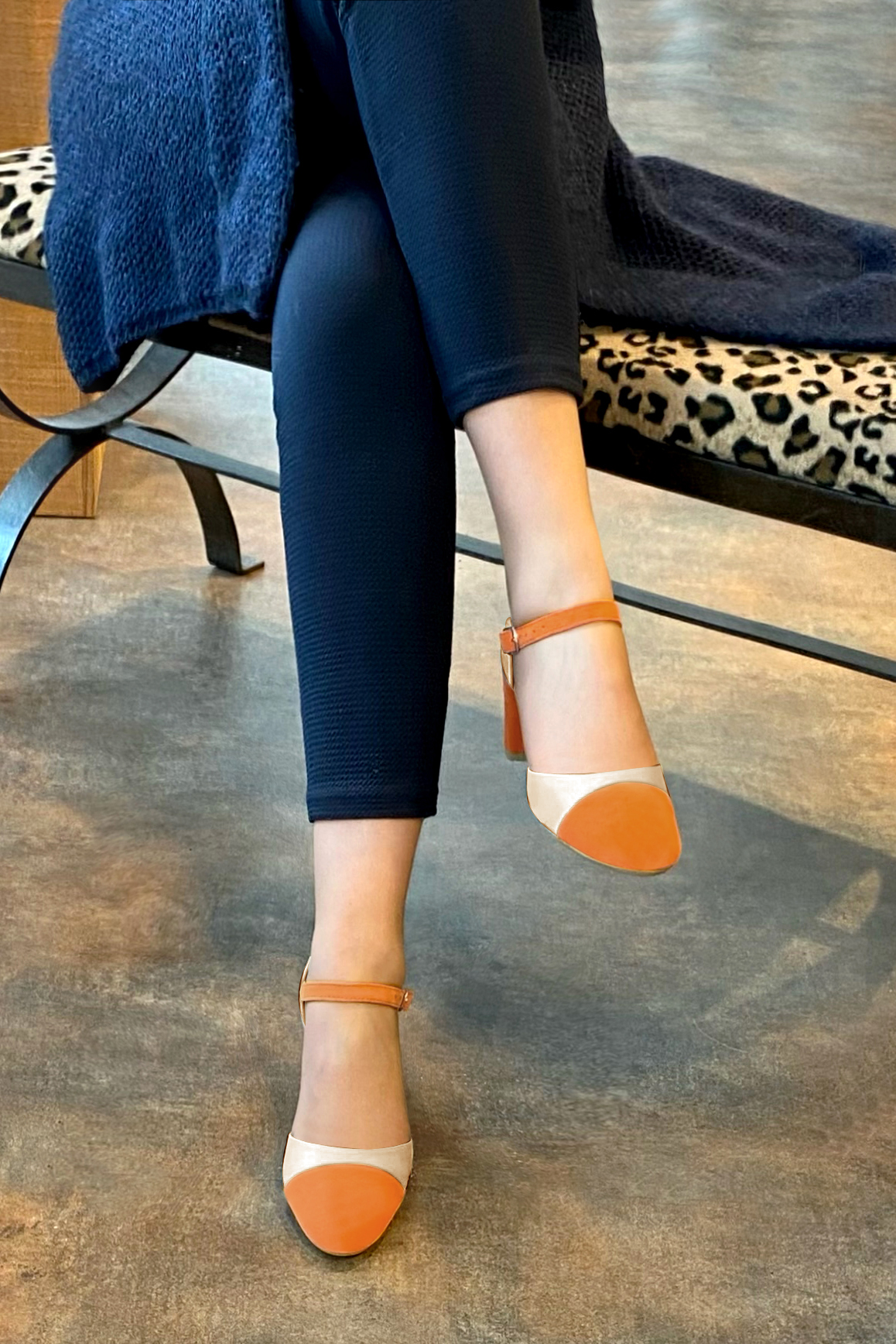 Apricot orange and champagne white women's open side shoes, with an instep strap. Round toe. Medium block heels. Worn view - Florence KOOIJMAN